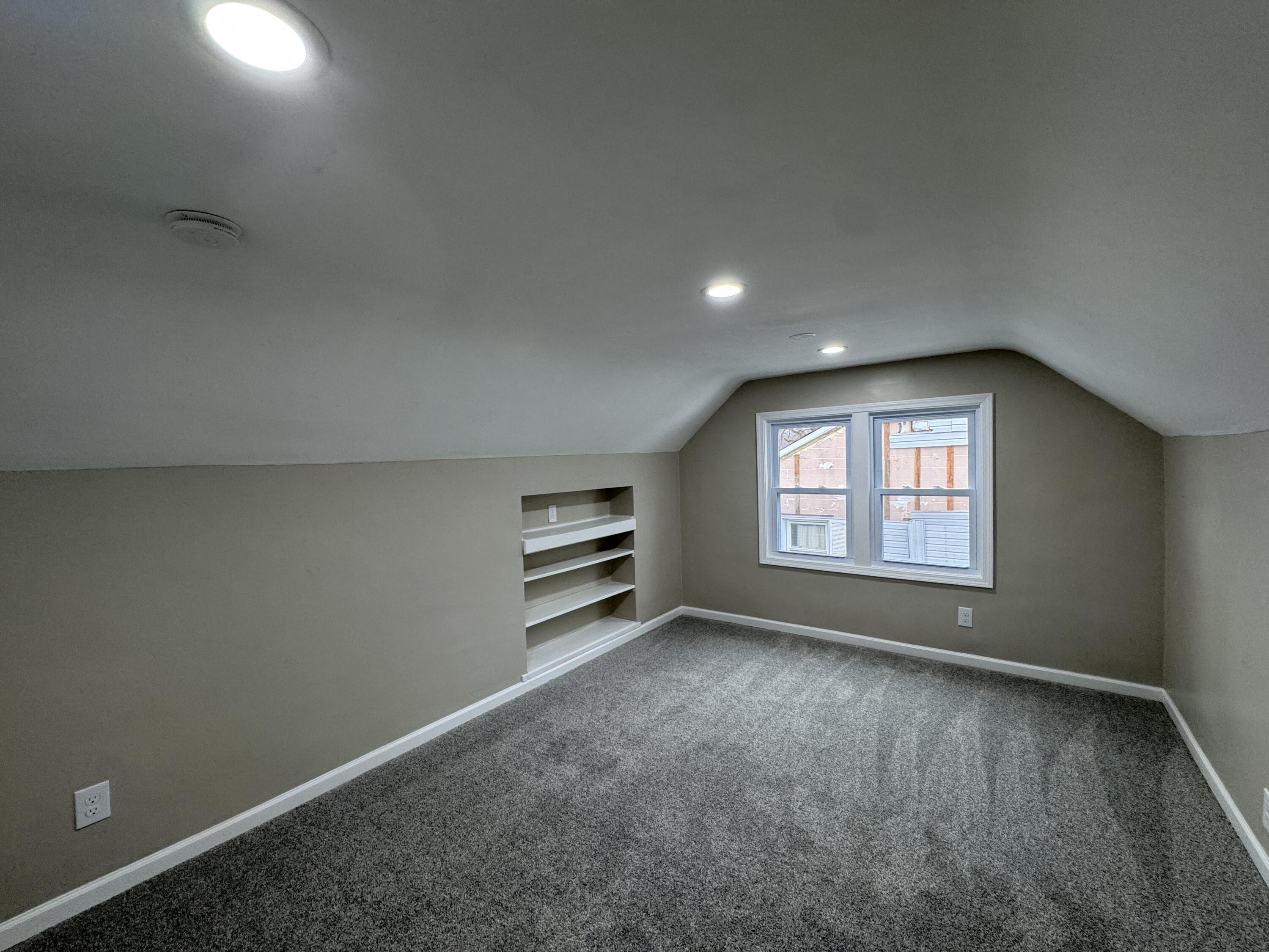 656 Montgomery Street Gary, IN 46403 - Photo 17 of 31 an empty room with windows