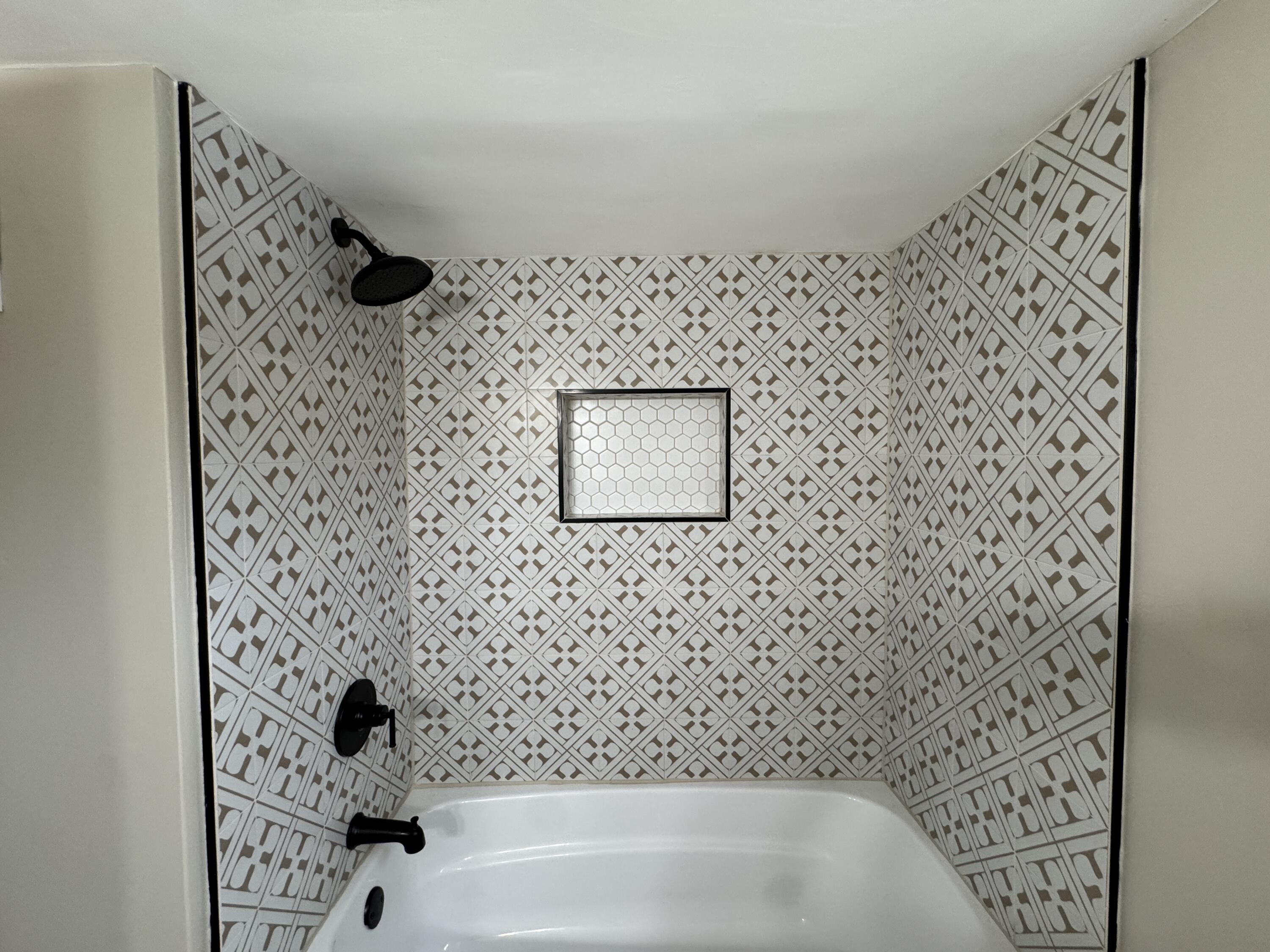 656 Montgomery Street Gary, IN 46403 - Photo 20 of 31 a bathroom with a bathtub and a shower