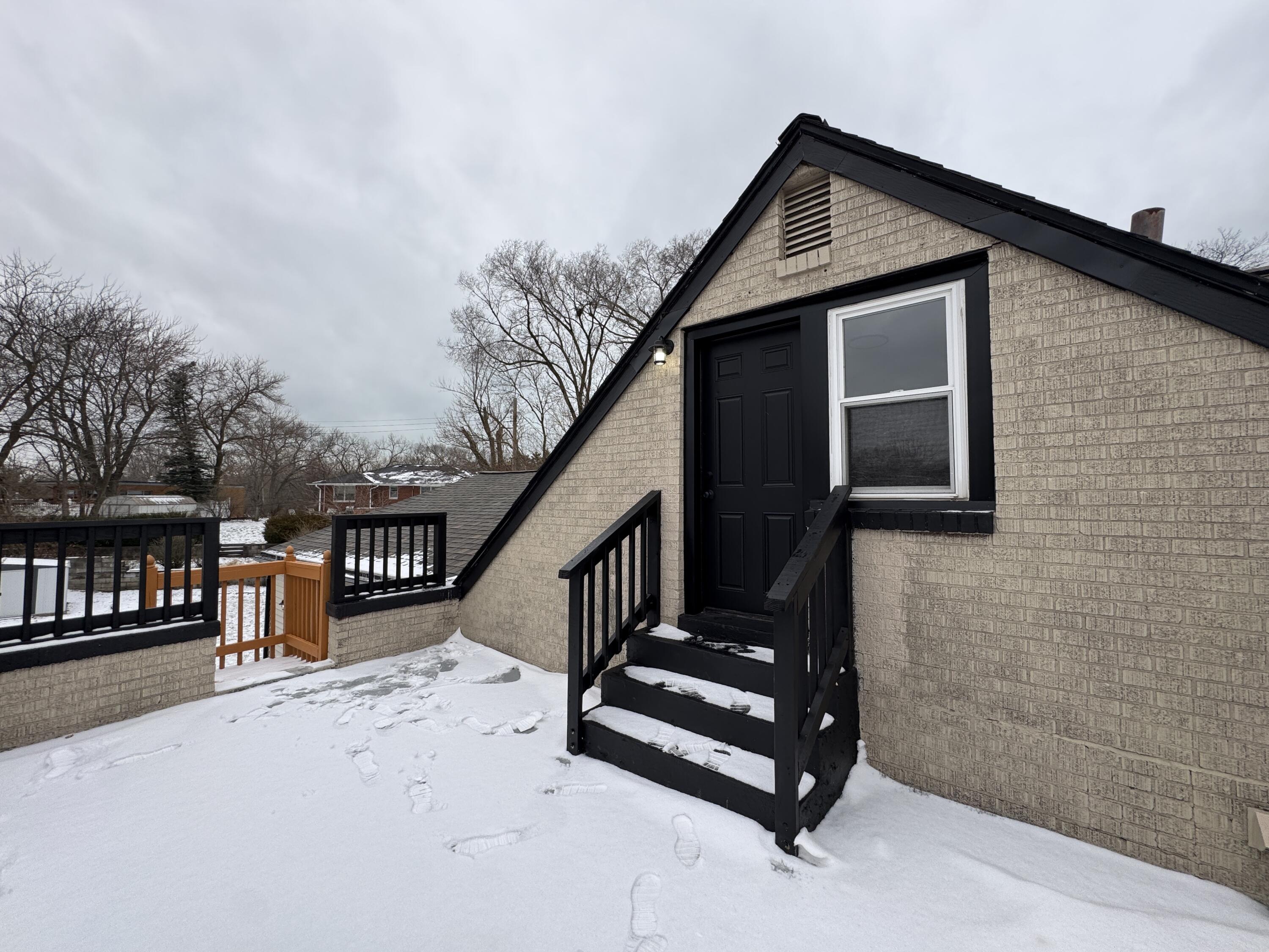 656 Montgomery Street Gary, IN 46403 - Photo 26 of 31 a front view of a house with wooden fence
