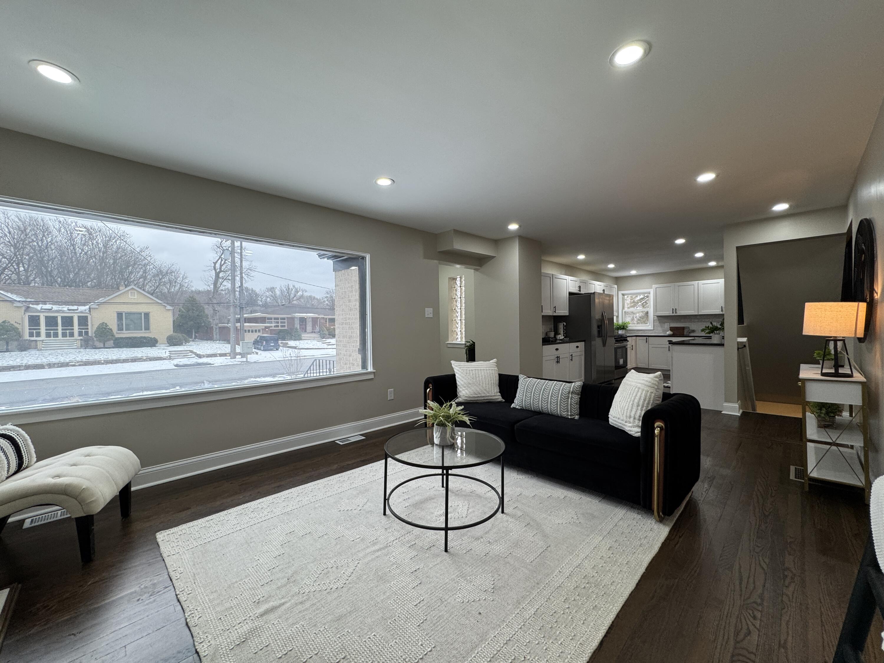 656 Montgomery Street Gary, IN 46403 - Photo 5 of 31 a living room with furniture and a large window