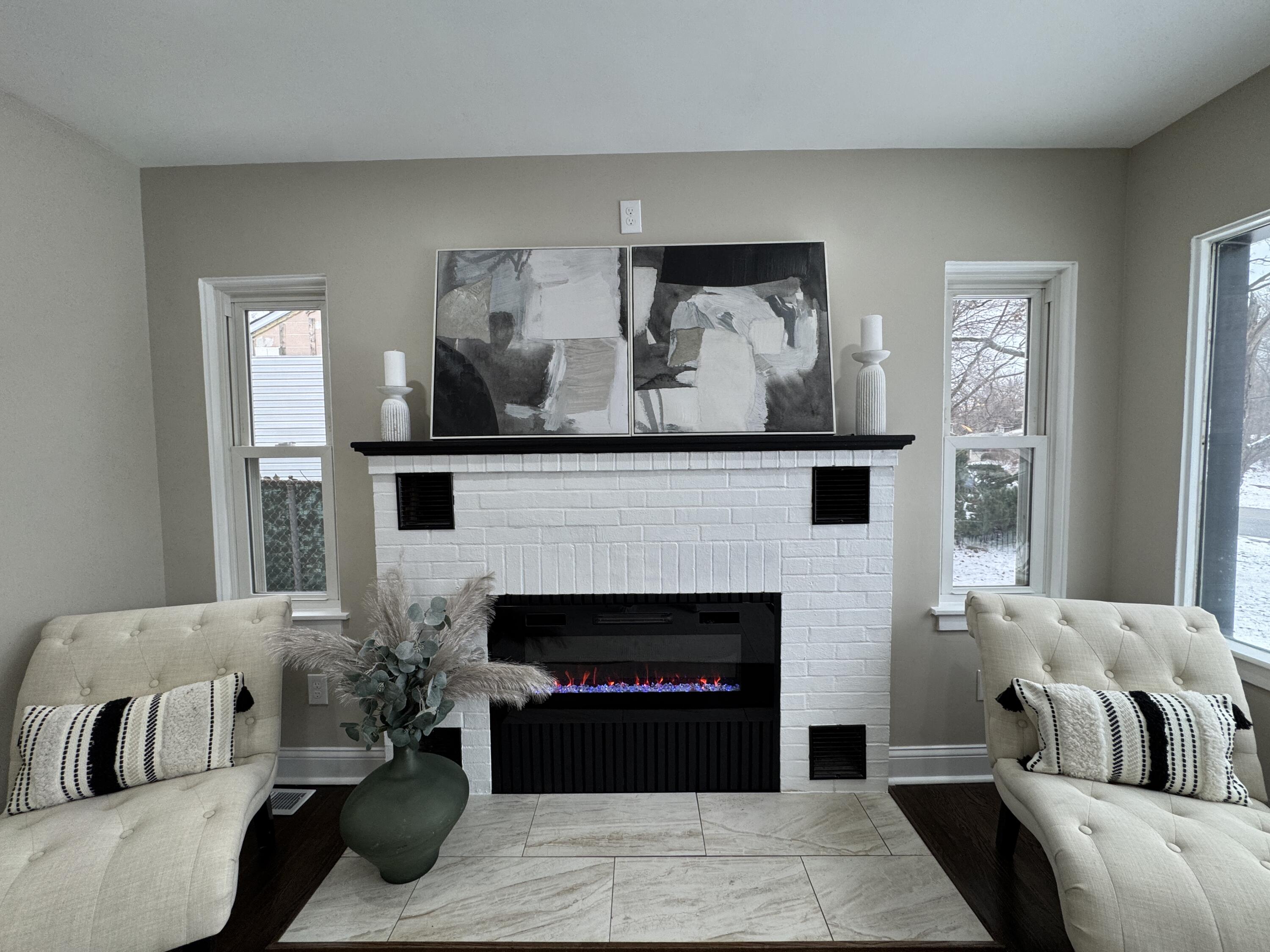656 Montgomery Street Gary, IN 46403 - Photo 6 of 31 a living room with furniture and a fireplace