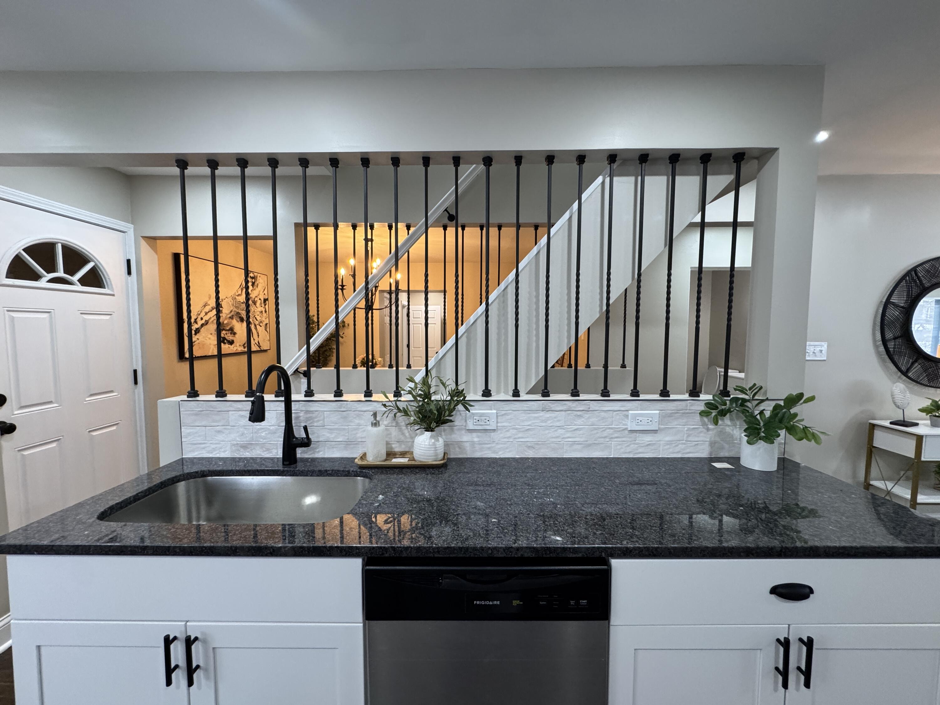 656 Montgomery Street Gary, IN 46403 - Photo 8 of 31 a kitchen with a sink and large window