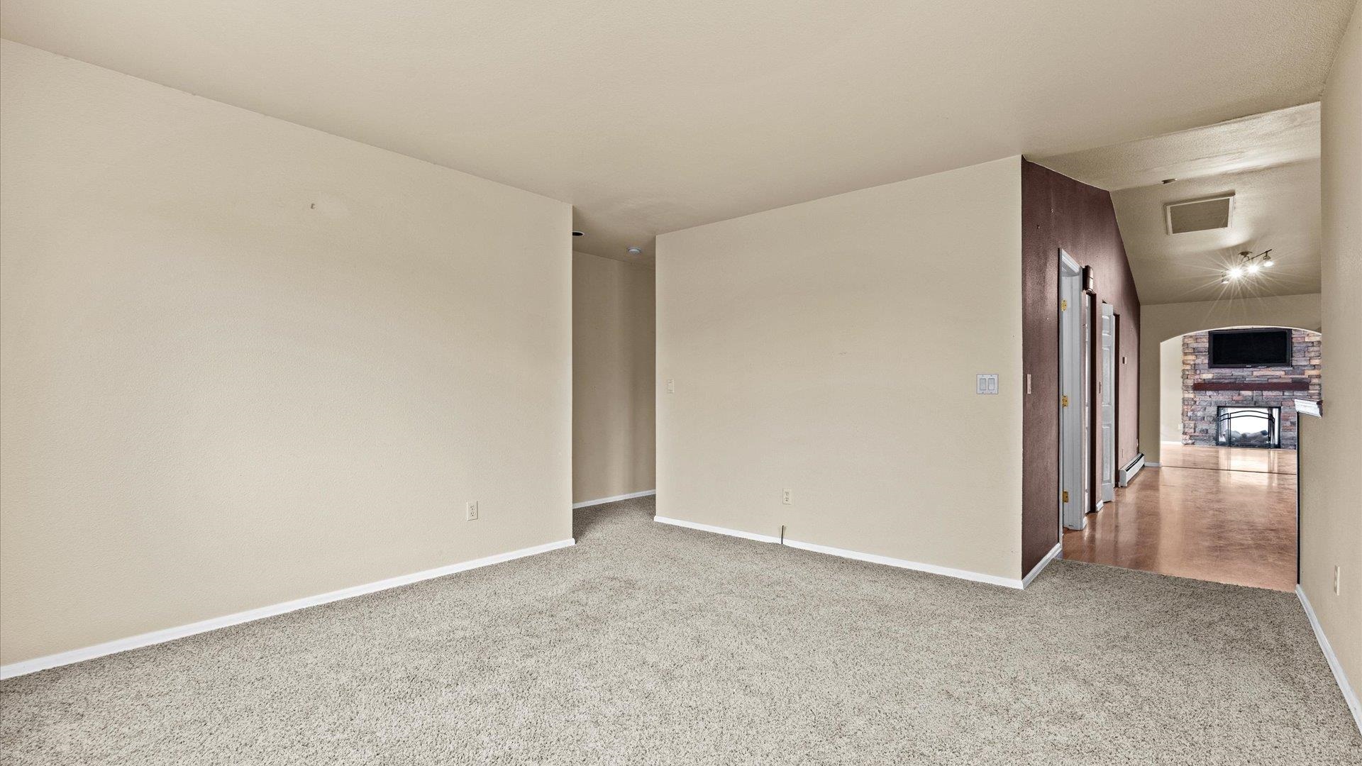 1195-17 1/2 North 1/2 Road Fruita, CO 81521 - Photo 18 of 33 an empty room with a door