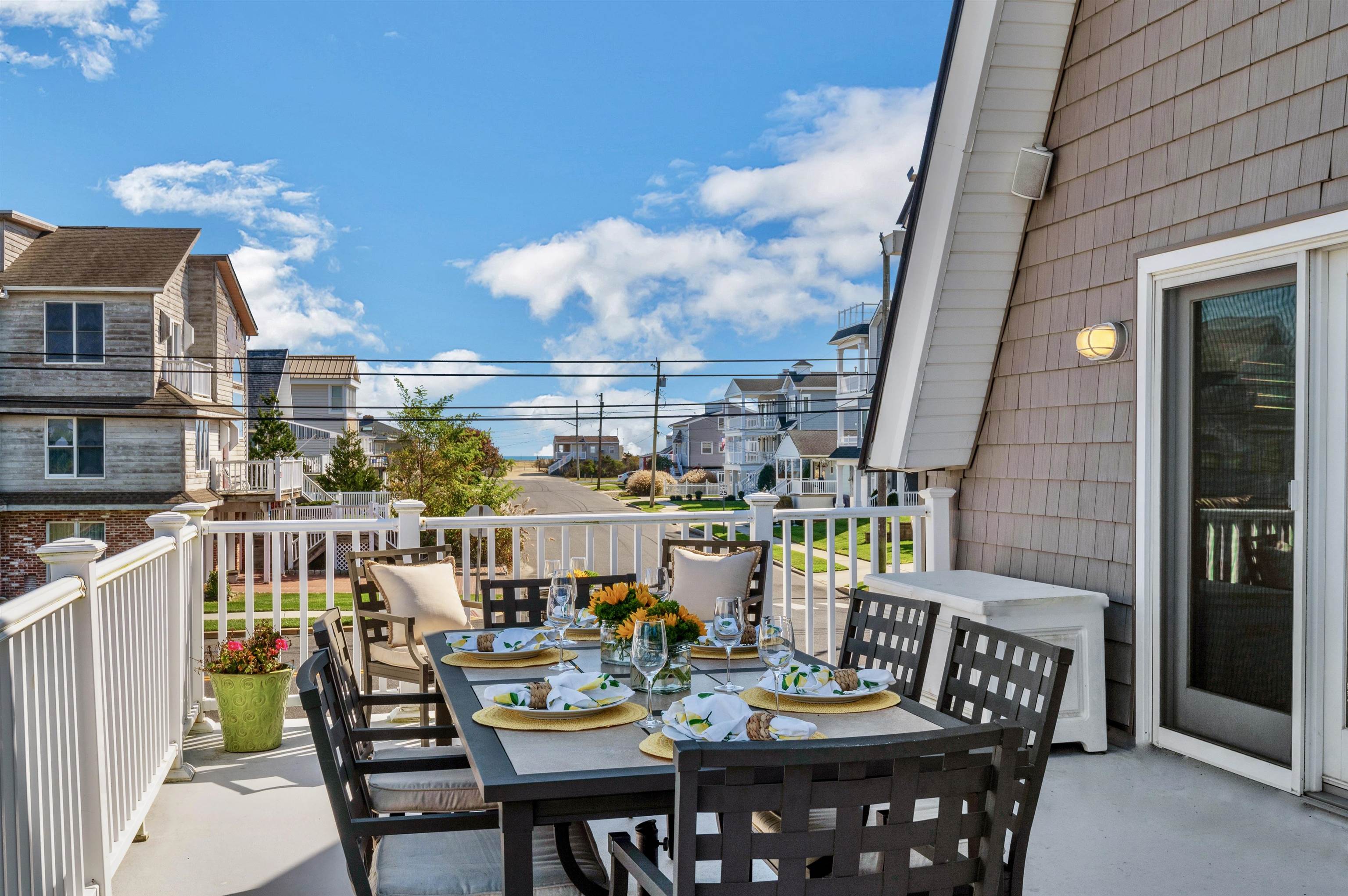 96 Commonwealth Avenue Strathmere, NJ 08248 - Photo 11 of 37 a view of an outside dining space with furniture