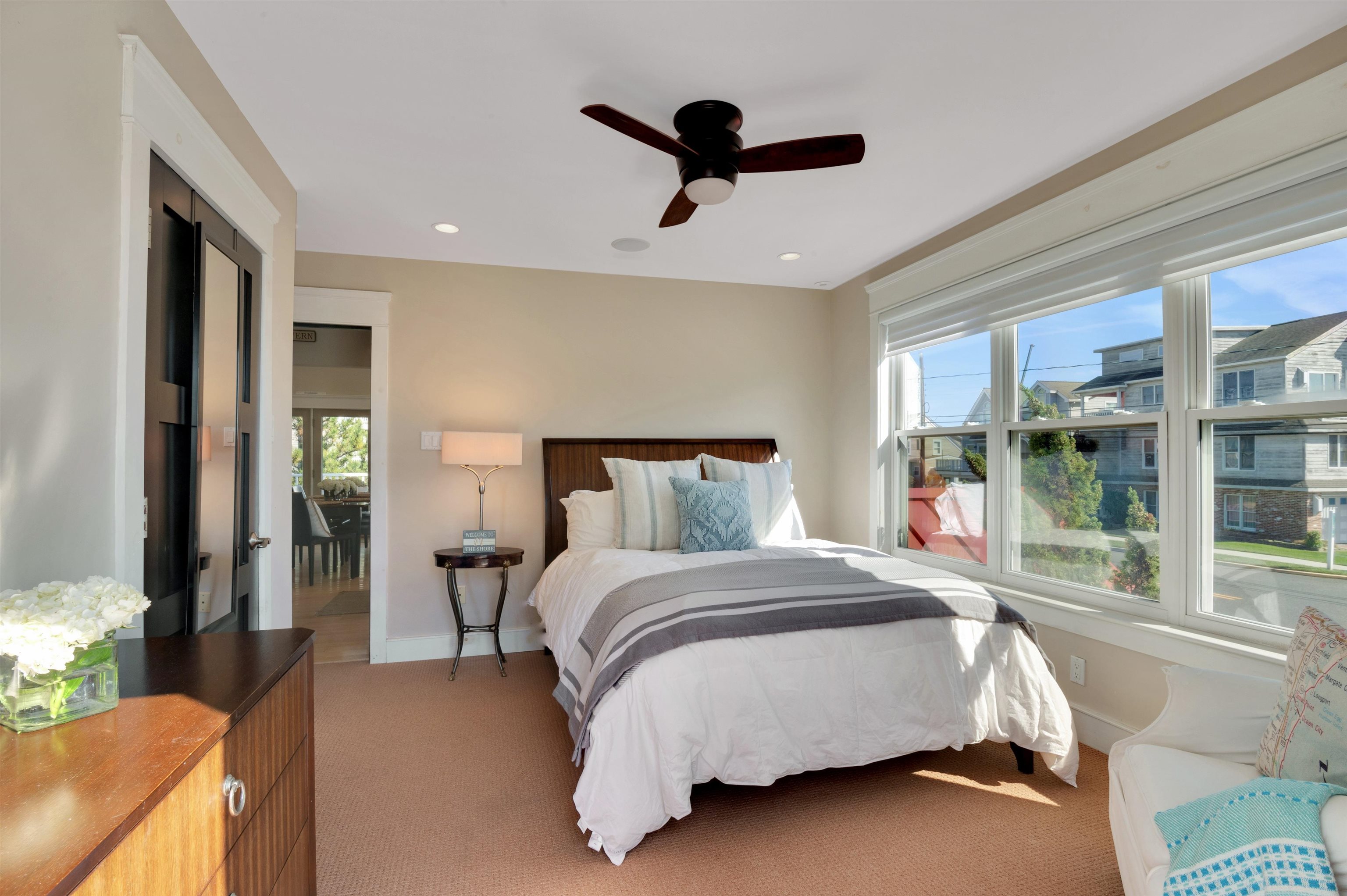 96 Commonwealth Avenue Strathmere, NJ 08248 - Photo 14 of 37 a bedroom with a bed and window