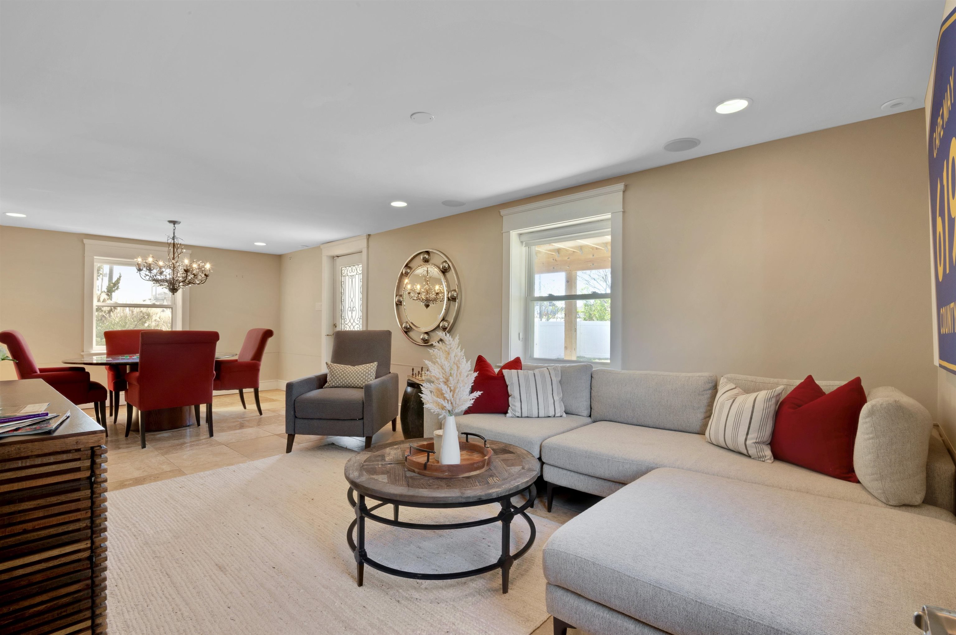 96 Commonwealth Avenue Strathmere, NJ 08248 - Photo 21 of 37 a living room with furniture and a window