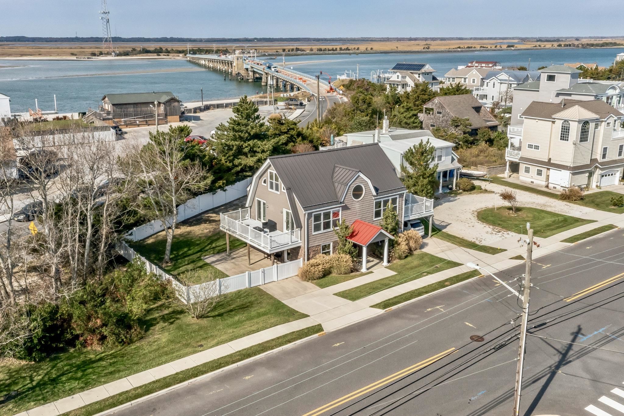 96 Commonwealth Avenue Strathmere, NJ 08248 - Photo 33 of 37 a view of swimming pool with outdoor seating and city view