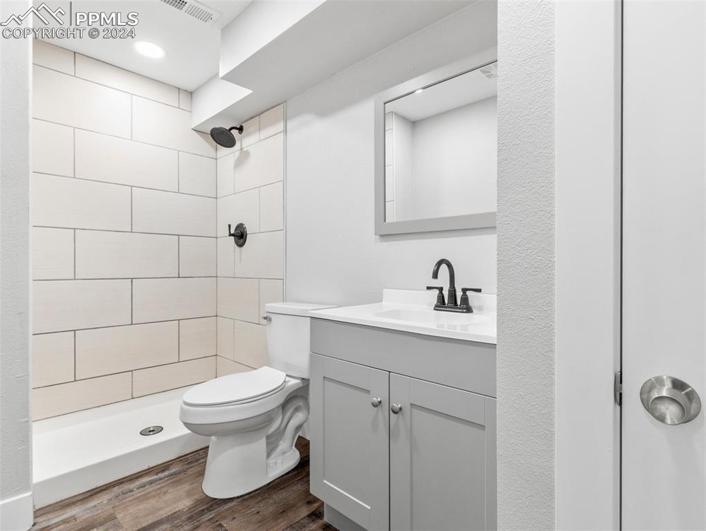 6455 Galbreth Road Pueblo, CO 81005 - Photo 19 of 37 a bathroom with a sink toilet and shower