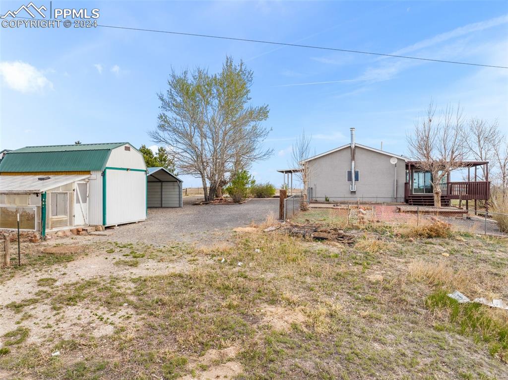 6455 Galbreth Road Pueblo, CO 81005 - Photo 2 of 37 a bathroom with a sink and a yard
