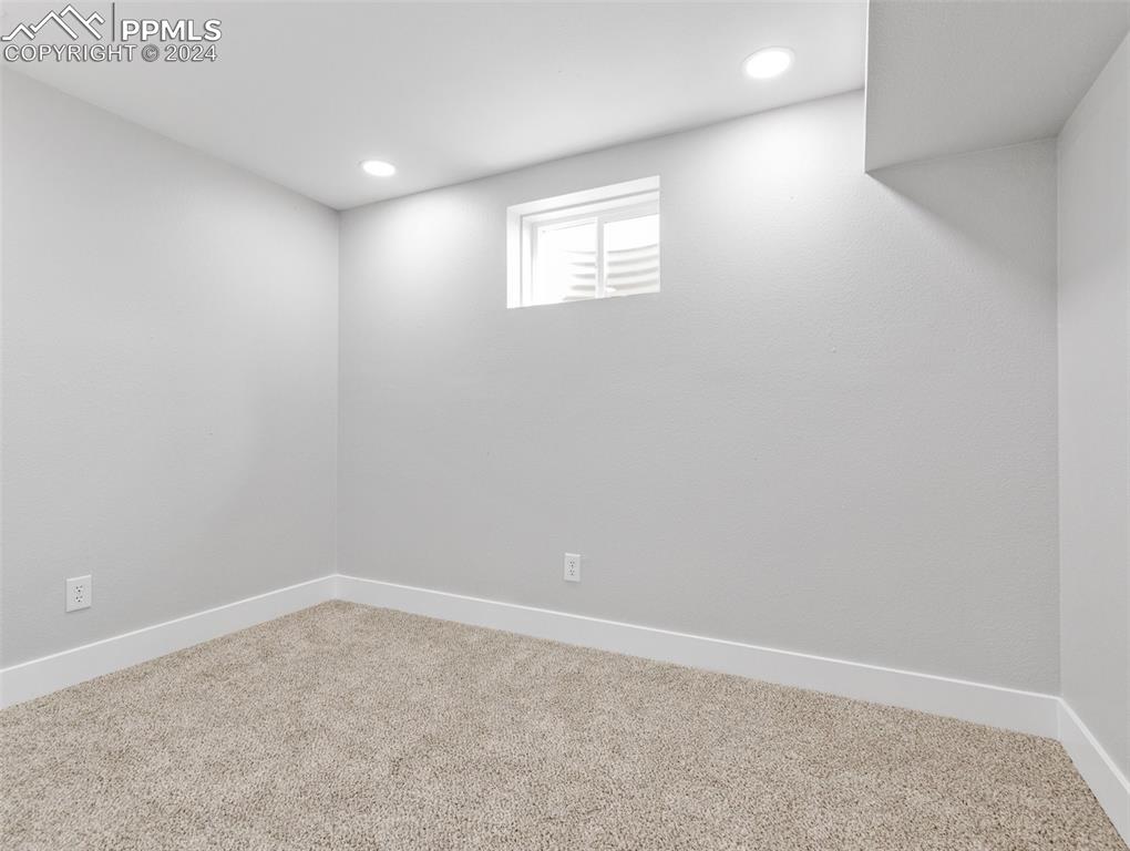 6455 Galbreth Road Pueblo, CO 81005 - Photo 21 of 37 an empty room with a workbench