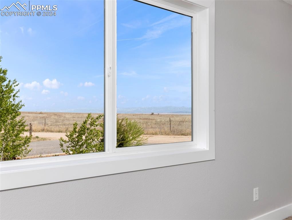 6455 Galbreth Road Pueblo, CO 81005 - Photo 26 of 37 a view of a room that has a window and a yard