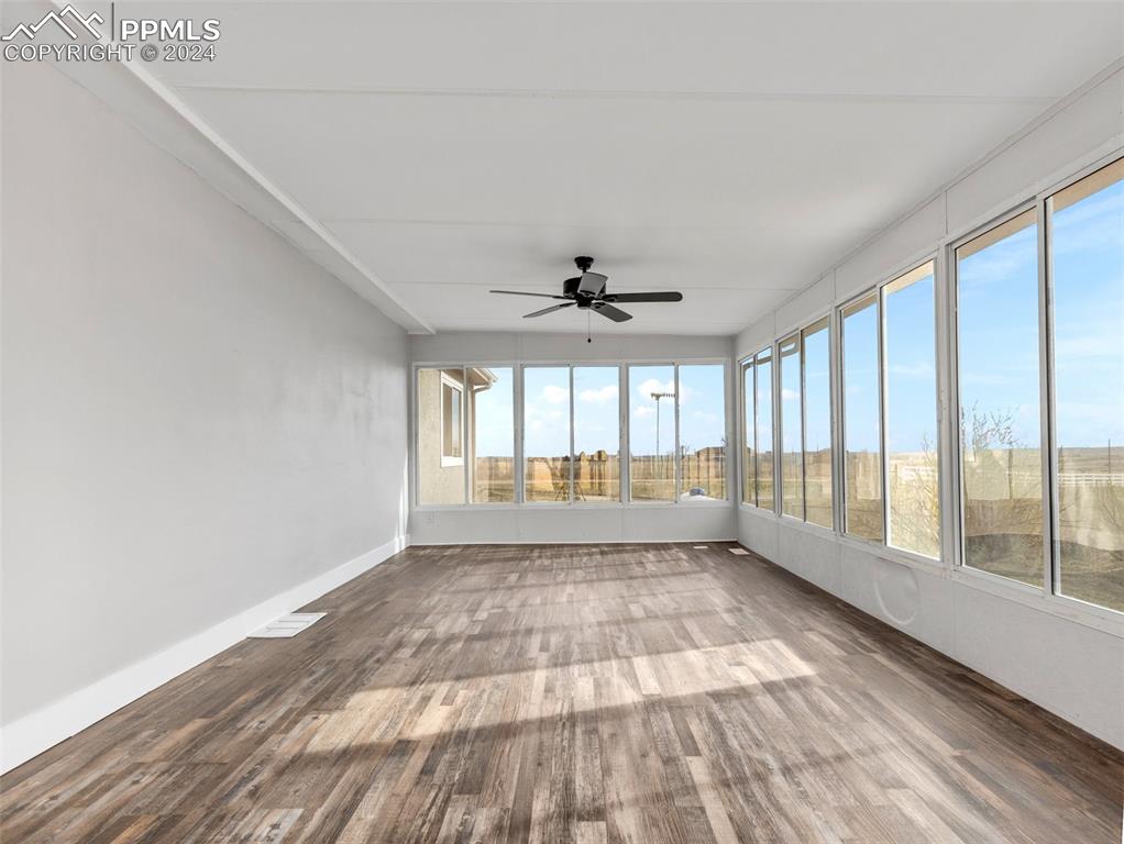 6455 Galbreth Road Pueblo, CO 81005 - Photo 28 of 37 a view of an empty room with a window