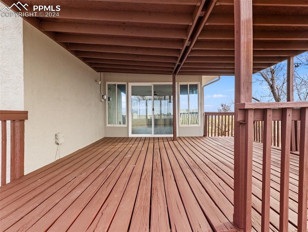 6455 Galbreth Road Pueblo, CO 81005 - Photo 34 of 37 a view of outdoor space with wooden floor