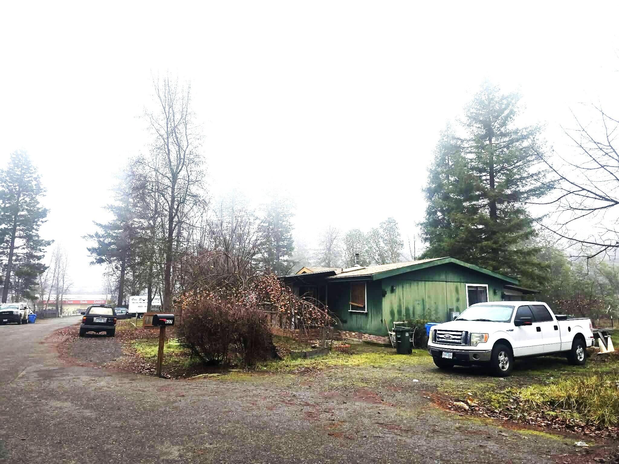 637 Frederick Court Cave Junction, OR 97523 - Photo 3 of 4 a view of street with parked cars