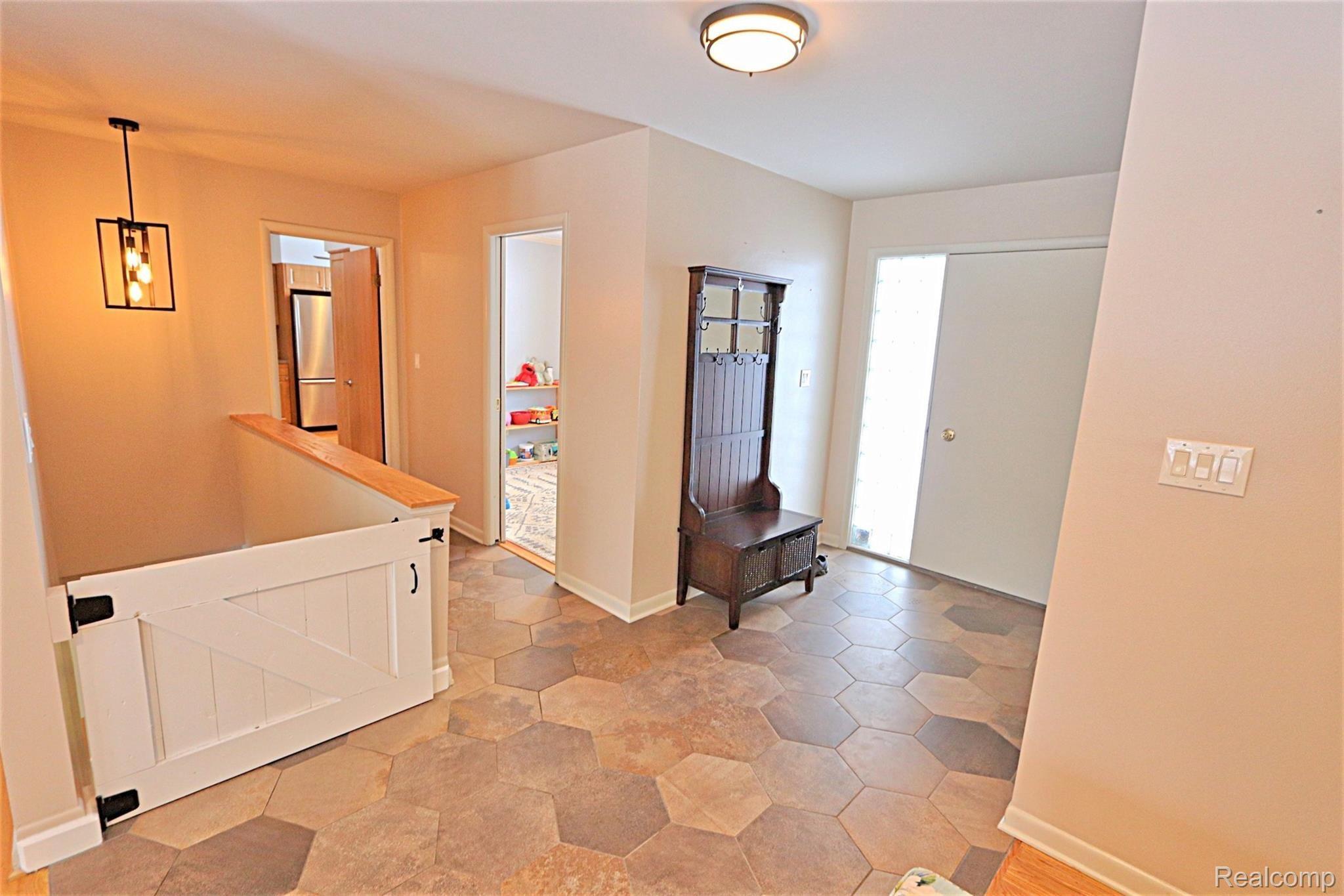 7141 Fairhill Road Bloomfield Hills, MI 48301 - Photo 24 of 47 Front Entry / Stairs to basement