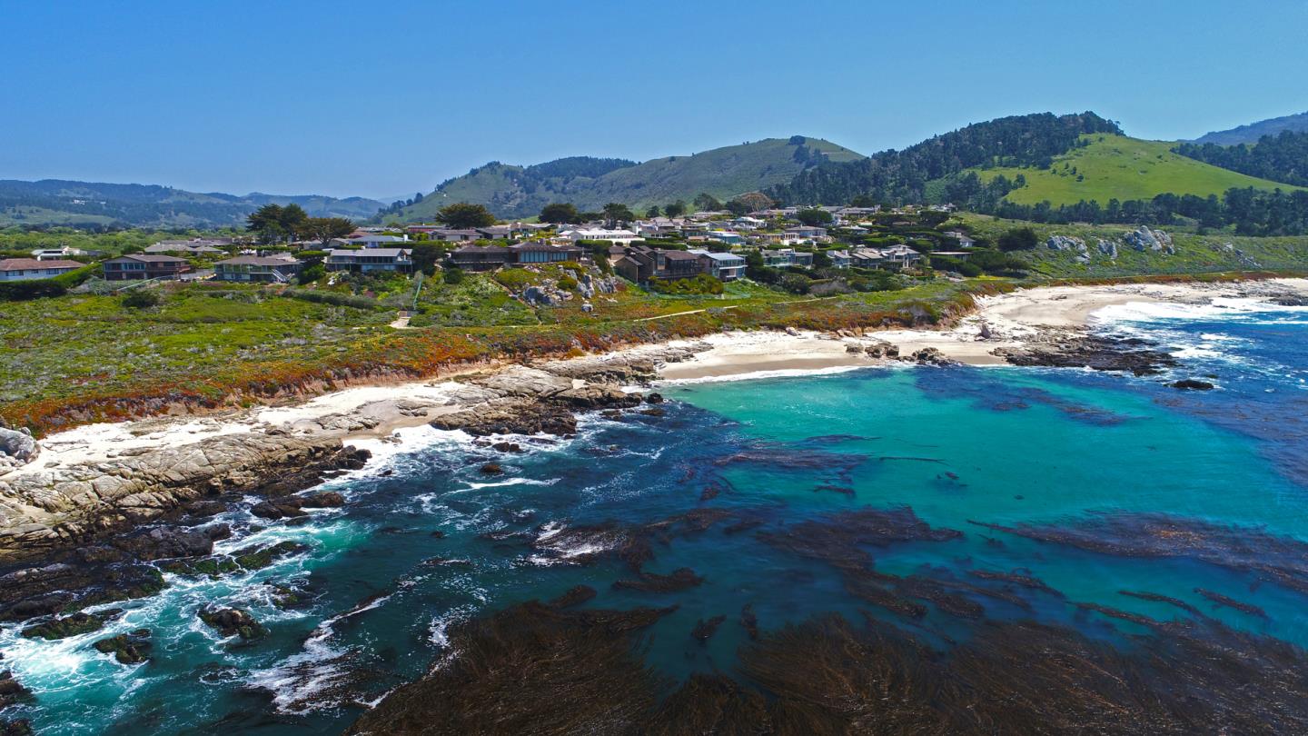 2715 Ribera Road Carmel, CA 93923 - Photo 14 of 14 a view of a lake with a mountain in the background