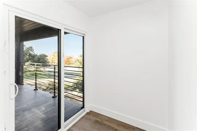 a view of a balcony with furniture