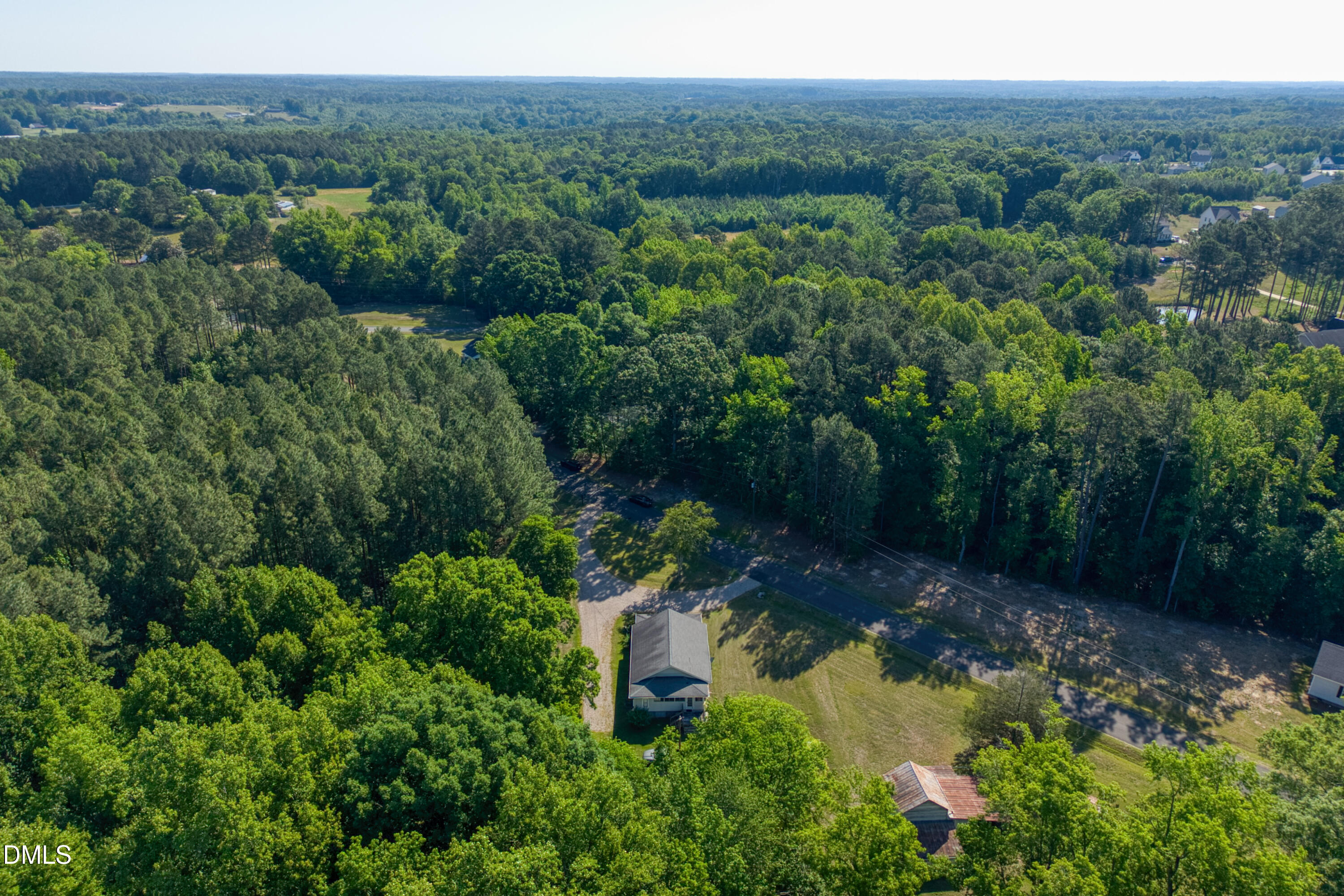 50 Robert Sledge Road Spring Hope, NC 27882 - Photo 45 of 50 an aerial view of a house with a yard
