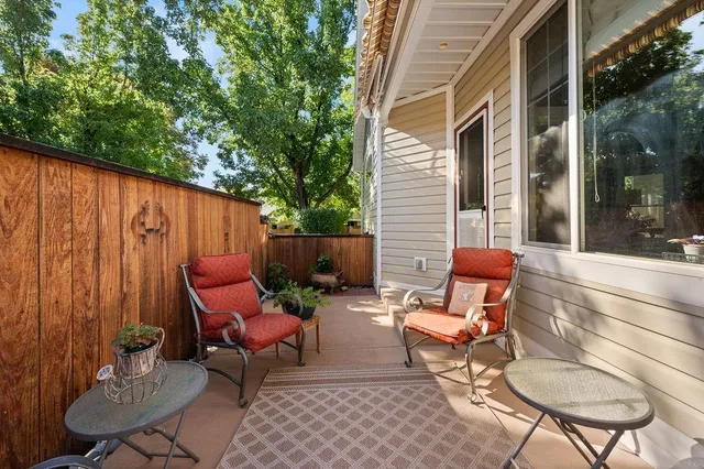 a view of backyard with outdoor seating