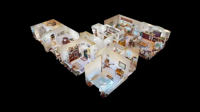 a bed sitting in a bedroom next to a lamp