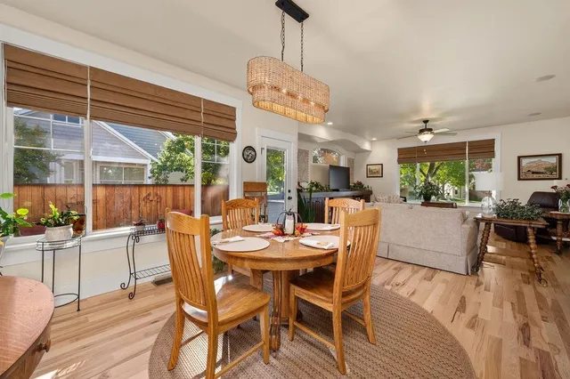 a view of a dining room with furniture window and outside view