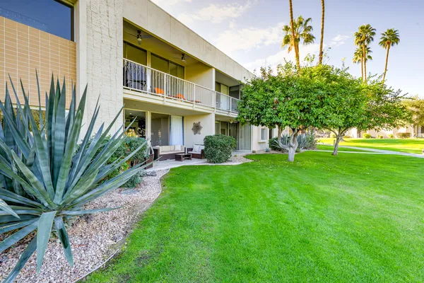 a view of yard in front of house with yard
