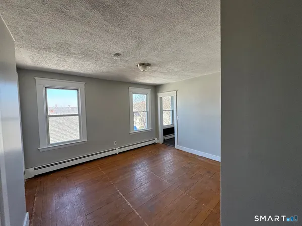 an empty room with windows