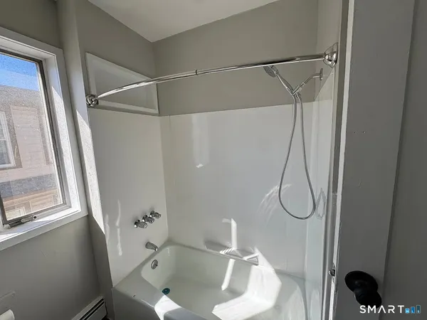 a bathroom with a sink and a shower
