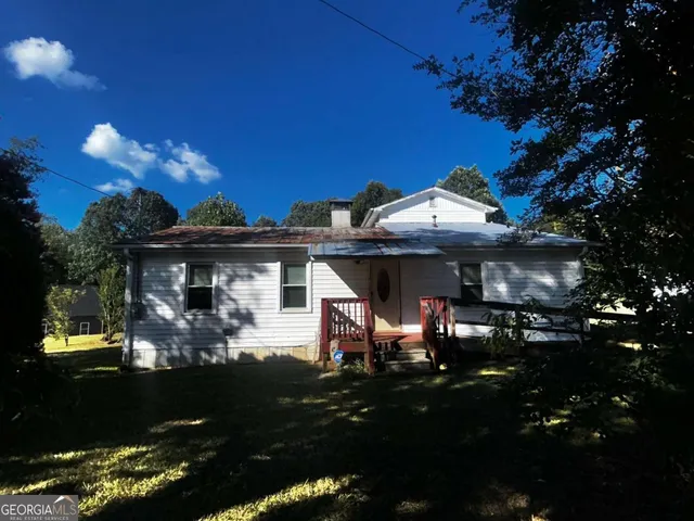 a view of a house with a patio