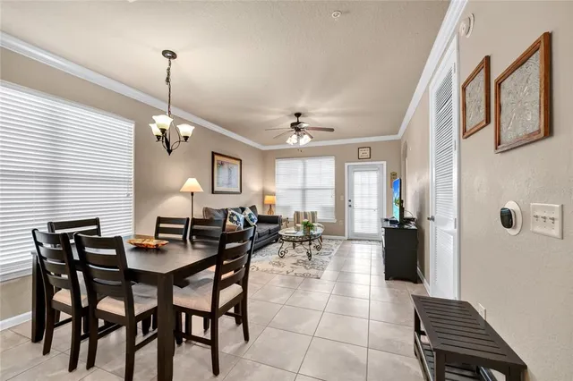 a view of a swimming pool with a bench and yard