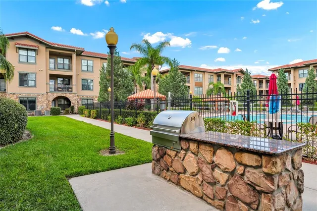 an aerial view of residential building and lake view