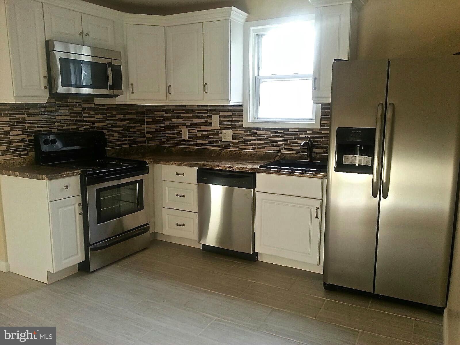 9016 Ardmore Road Springdale, MD 20706 - Photo 5 of 17 Kitchen