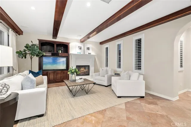 a bedroom with a bed and a lamp