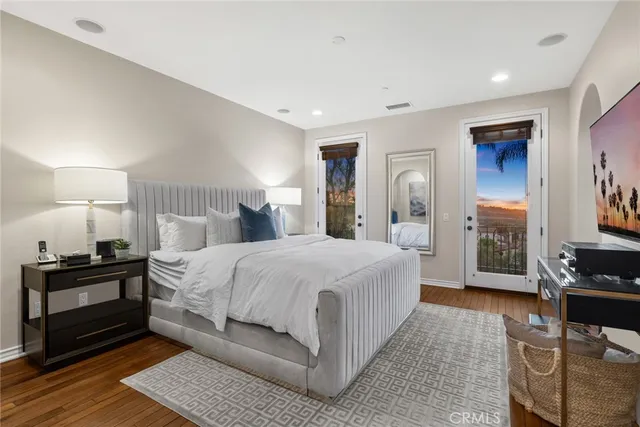 an aerial view of a swimming pool and patio