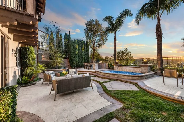 a living room with furniture potted plant and a window