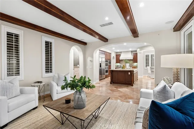 a kitchen with stainless steel appliances granite countertop a stove a sink dishwasher a refrigerator and a oven