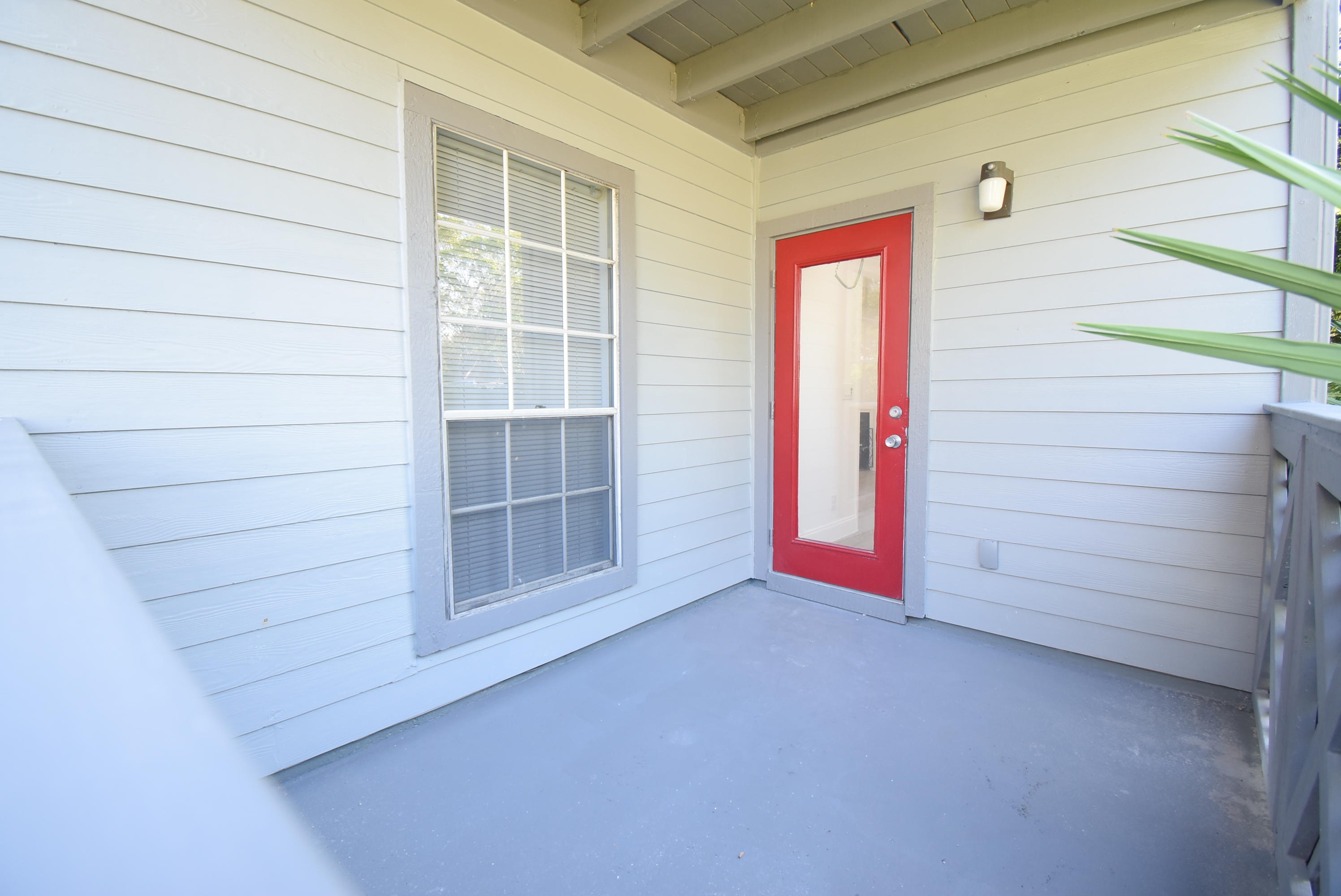 5047 Heatherhill Lane, Unit 60 Boca Raton, FL 33486 - Photo 18 of 34 a view of wooden door and brick walls