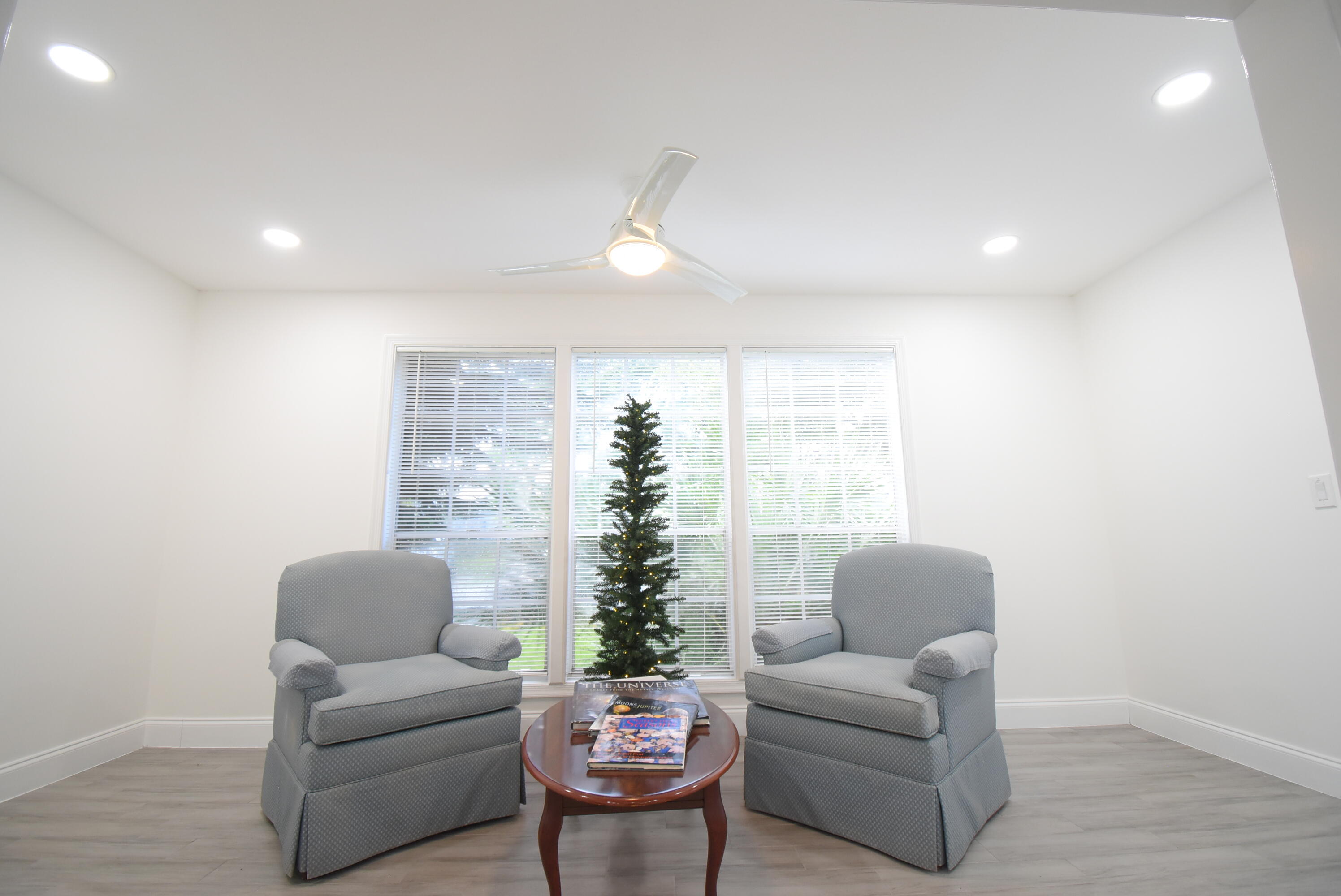 5047 Heatherhill Lane, Unit 60 Boca Raton, FL 33486 - Photo 7 of 34 a living room with furniture and a large window