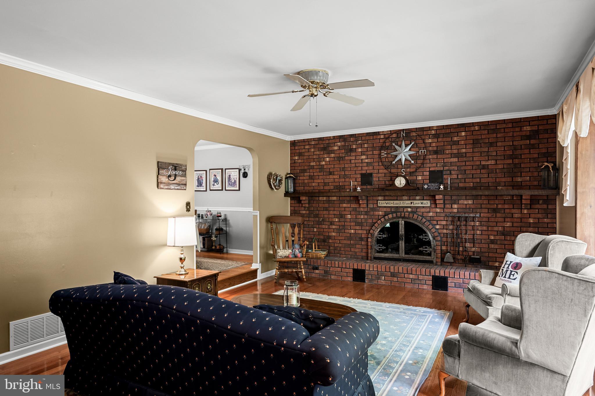 494 Arneys Mt Road Pemberton, NJ 08068 - Photo 5 of 47 a living room with furniture and a fireplace