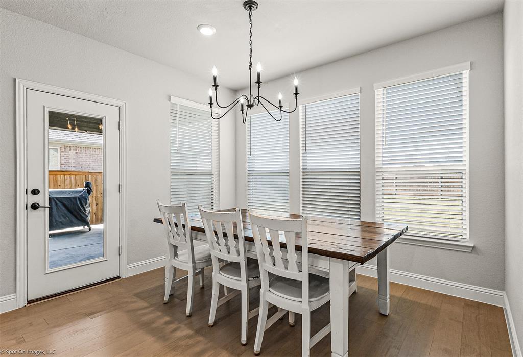 904 Vineyard Way Forney, TX 75126 - Photo 12 of 38 a dining room with furniture and window