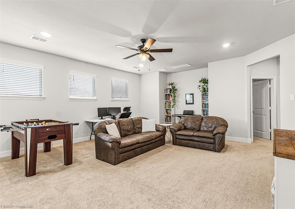 904 Vineyard Way Forney, TX 75126 - Photo 24 of 38 a living room with furniture