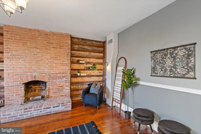 a bathroom with a sink vanity and a mirror