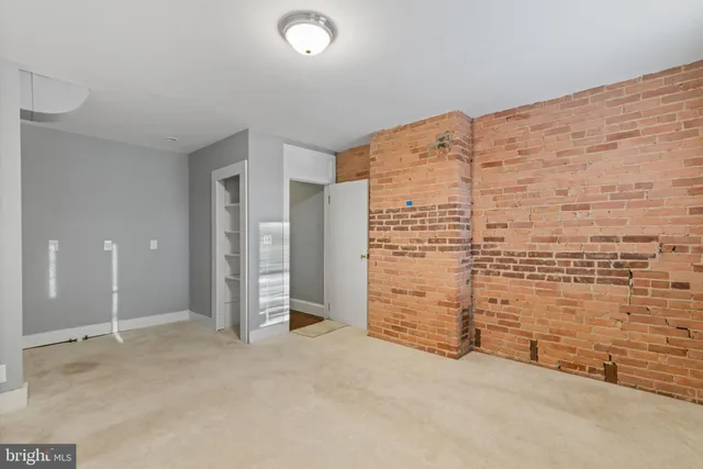 a view of a room with an empty space