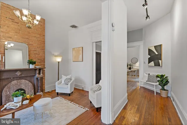 a view of a wooden door and a window