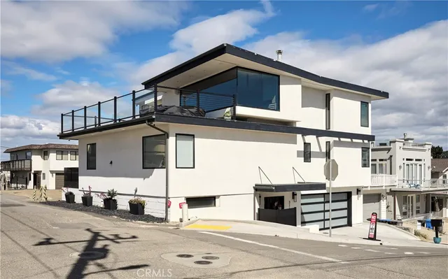 a front view of a house with a garage