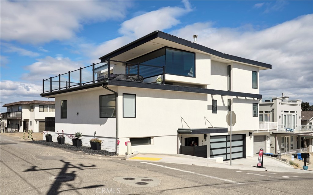 a front view of a house with a garage