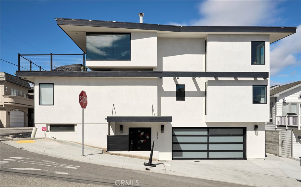 311 Juanita Avenue Oceano, CA 93445 - Photo 2 of 27 a front view of a building with entryway