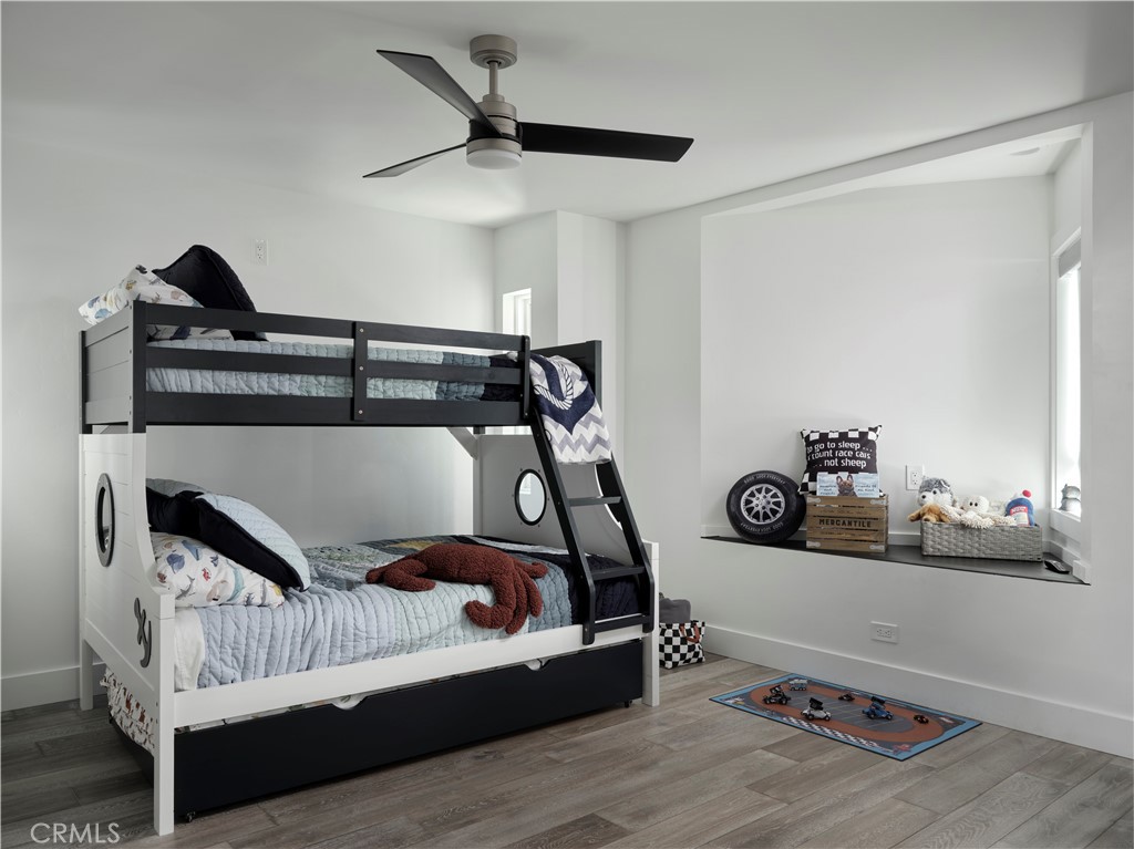 311 Juanita Avenue Oceano, CA 93445 - Photo 22 of 27 a bedroom with a bed and a dresser