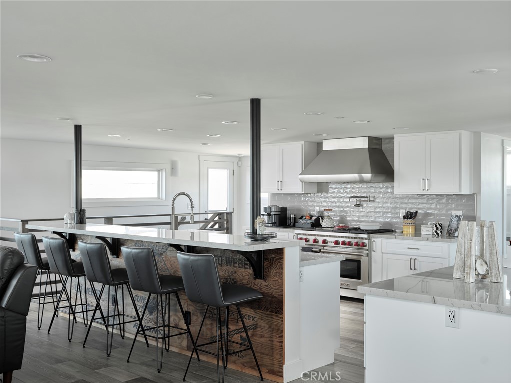 311 Juanita Avenue Oceano, CA 93445 - Photo 5 of 27 a kitchen with a sink stove and cabinets