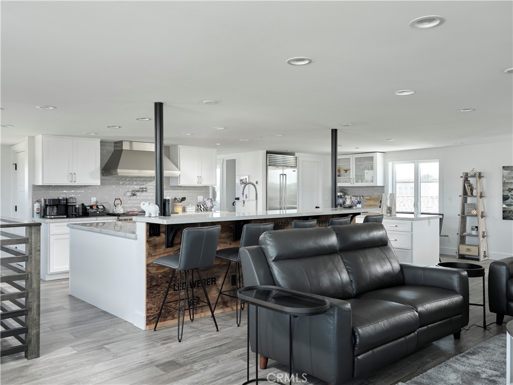 311 Juanita Avenue Oceano, CA 93445 - Photo 7 of 27 a living room with furniture and kitchen view